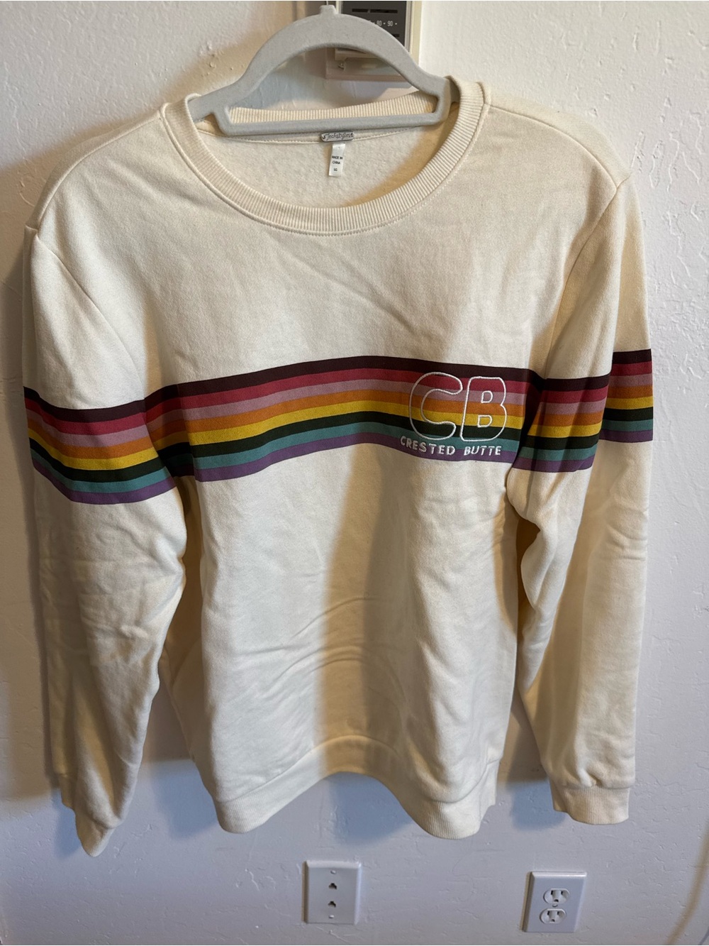 Crested Butte CB Cream Crewneck Sweater with Rainbow Stripe